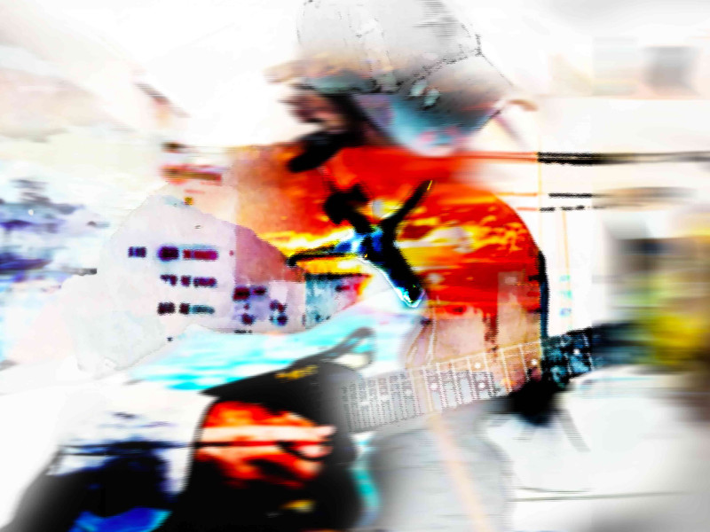 Guitariste sur fond de couleurs